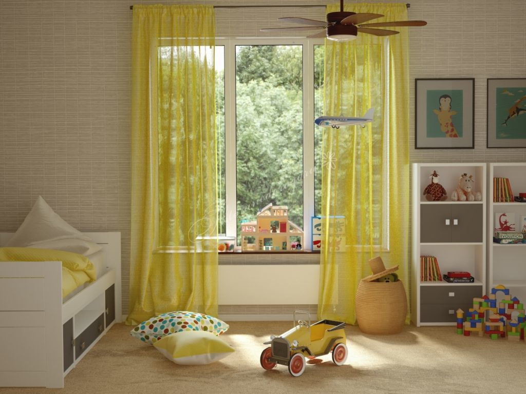 Geltona tiulis mažoje vaiko kambaryje