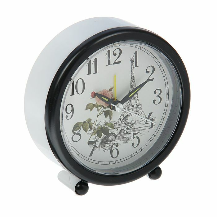 Alarm clock circle on legs, black edging, Eiffel Tower on the dial, hands are shining d = 10cm