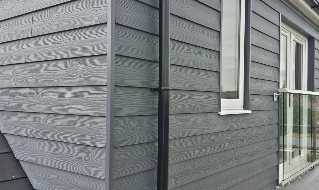 Cement siding on the facade of the house