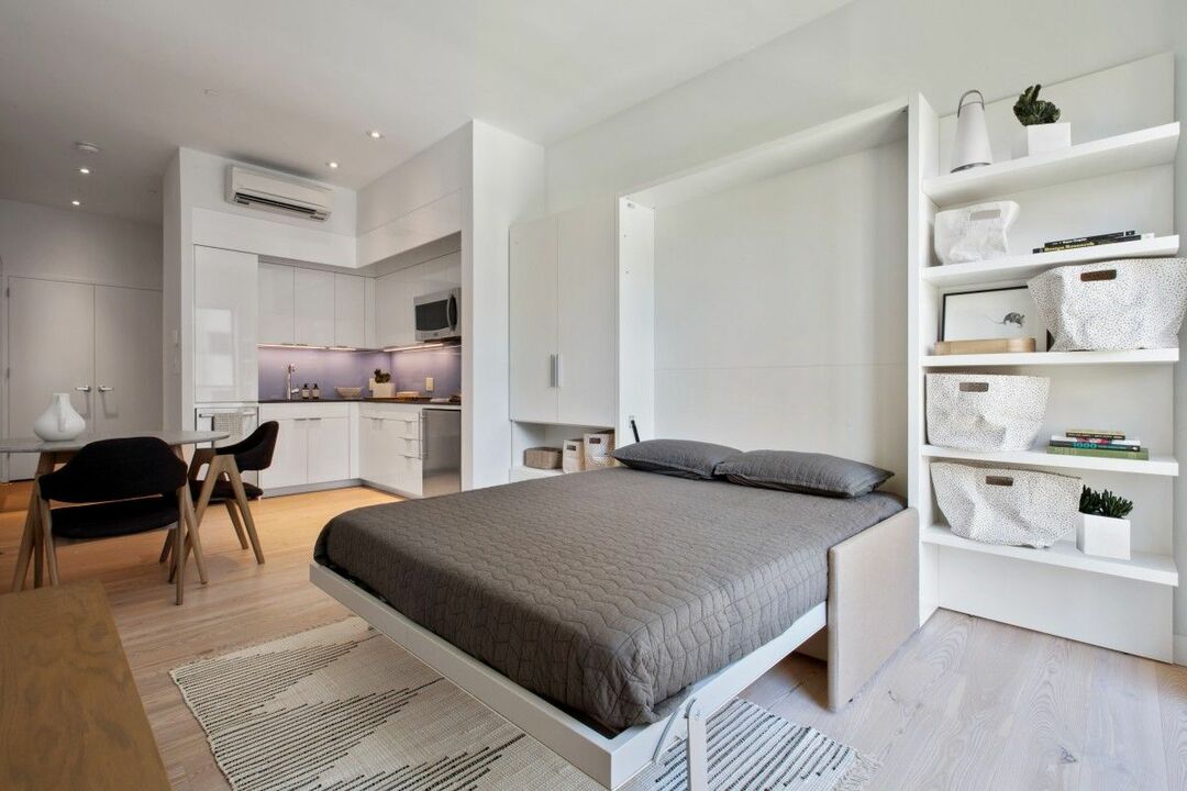 Studio apartment with a folding bed in the interior
