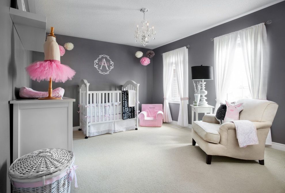 Pink accents in a gray nursery