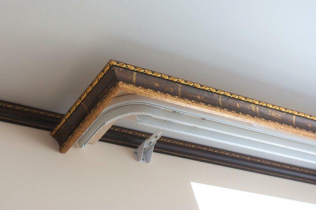 Decorative molding with fixing on the ceiling of the room