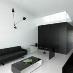 Dark sofa in a white living room
