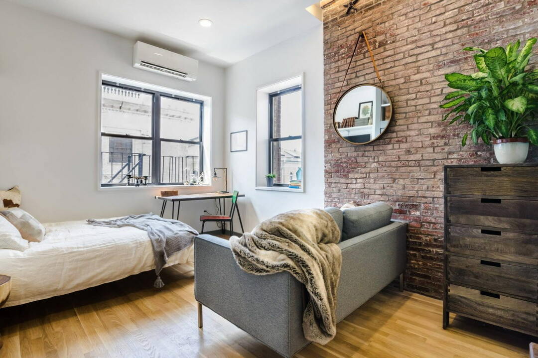 Brick wall in a one room apartment