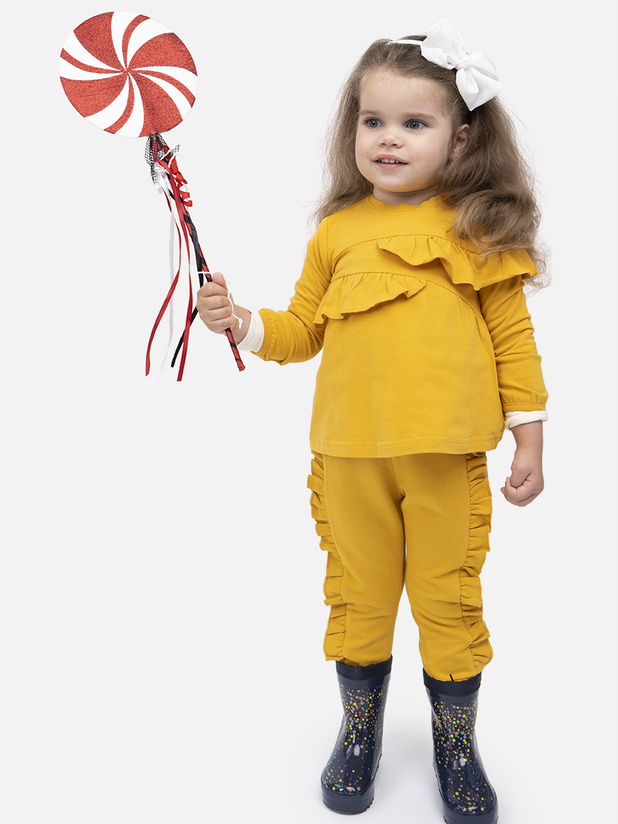 Mädchen gelbe Strickhose mit Rüschen