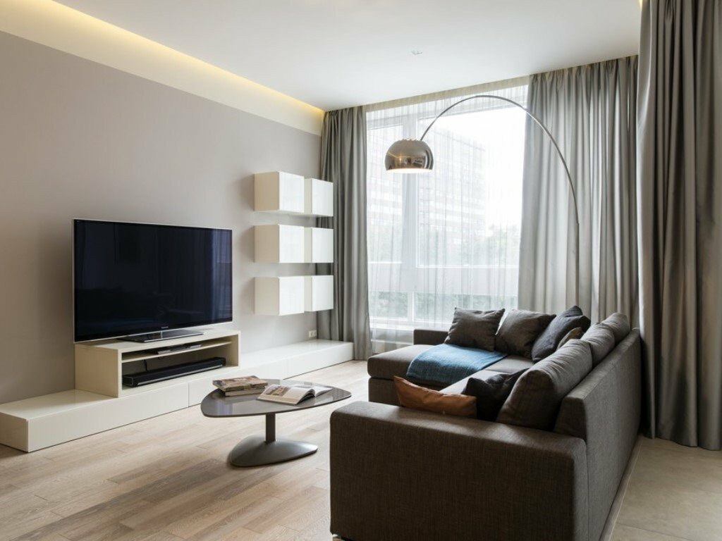 Arrangement of furniture in a minimalist style apartment