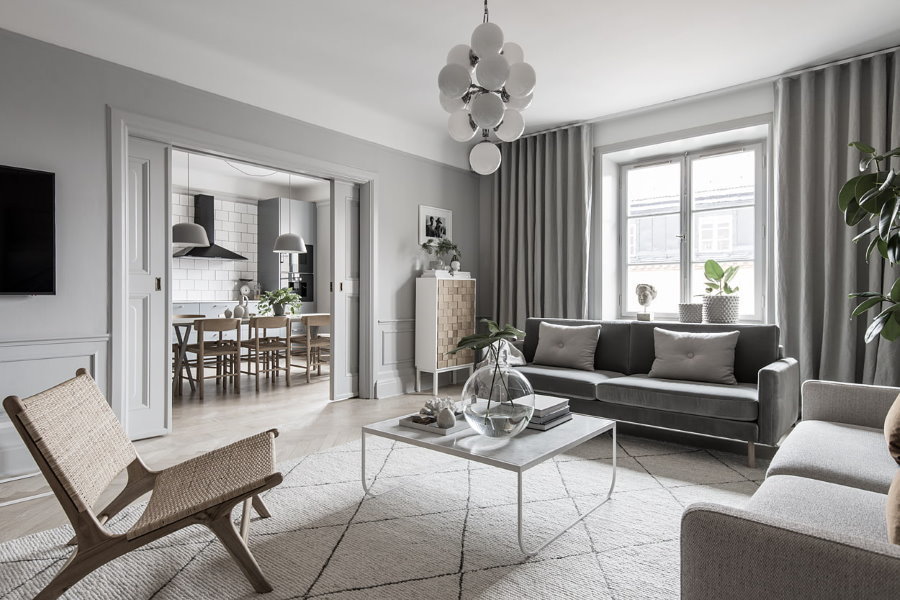 Design of the living room of the apartment in gray