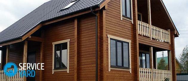 How to paint a wooden house from the outside?