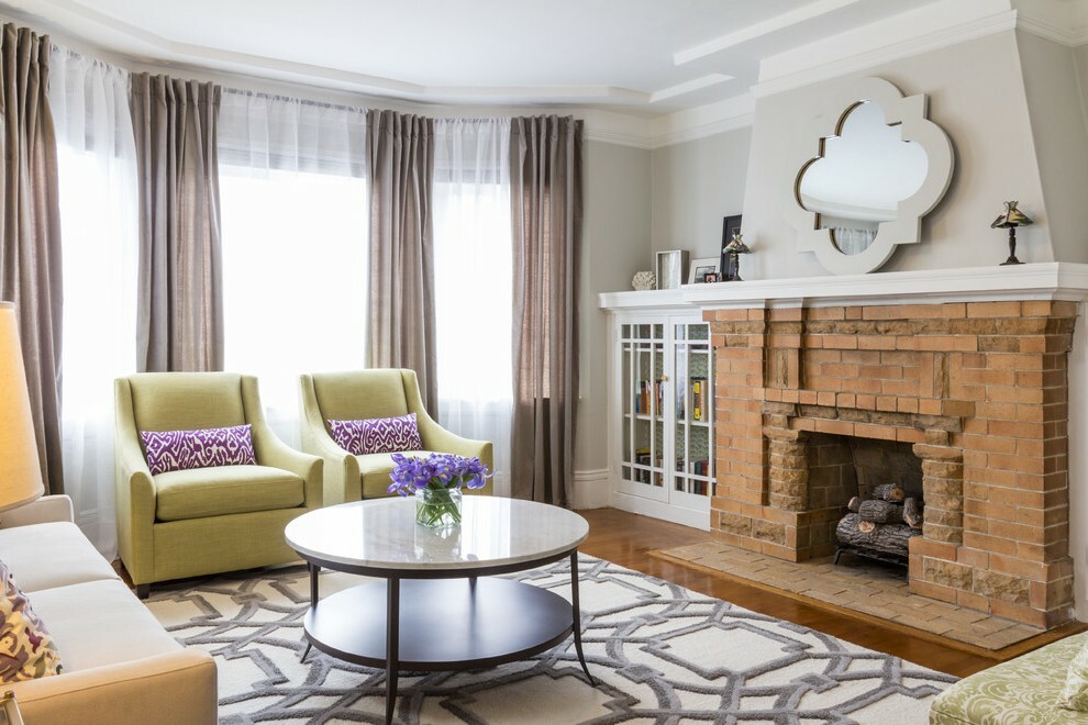 Armchairs in the fireplace area of ​​the guest room