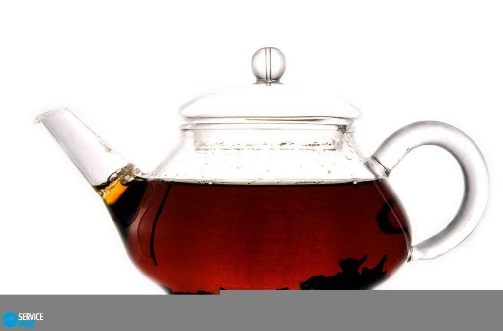 Hoe maak je de theepot van de thee plaque schoon?