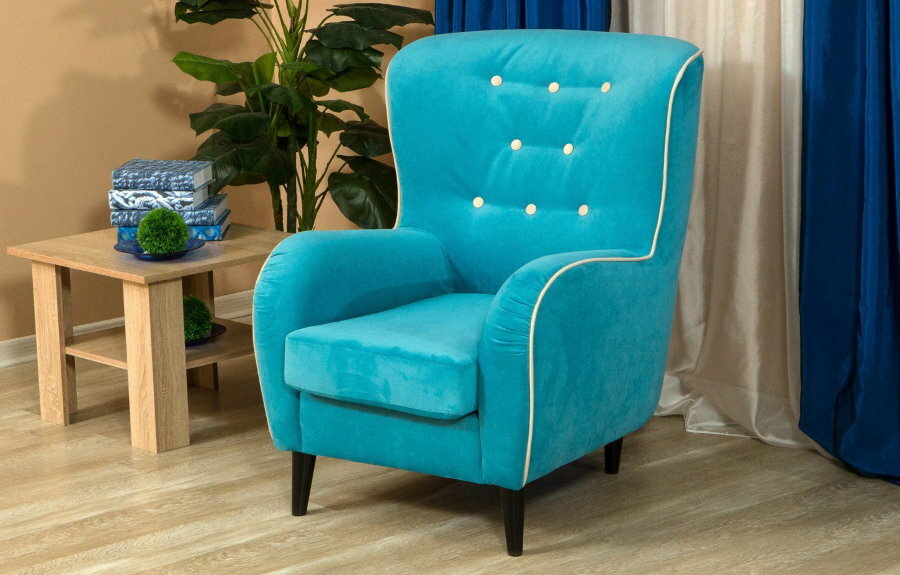 Small armchair with turquoise fabric upholstery