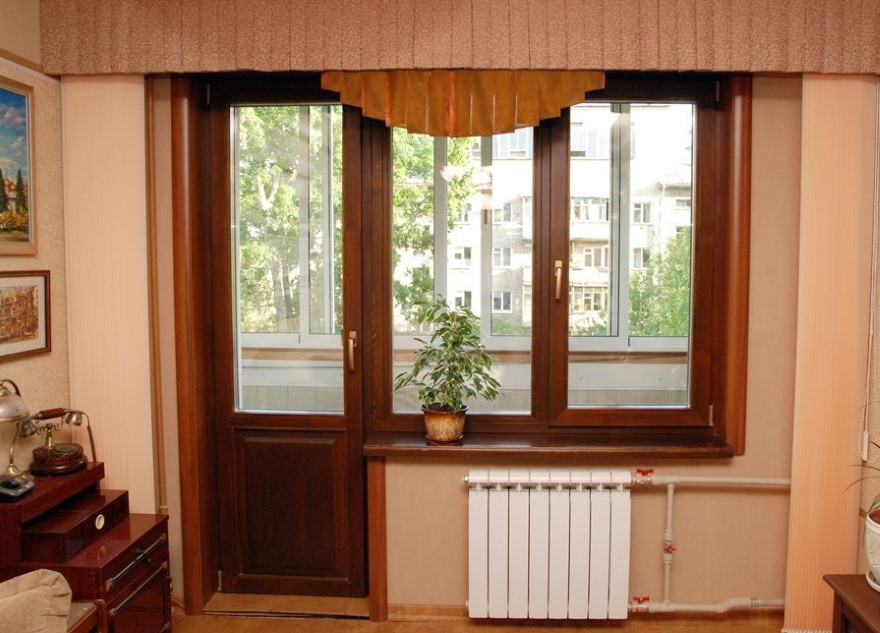 Balcony door with opaque insert at the bottom