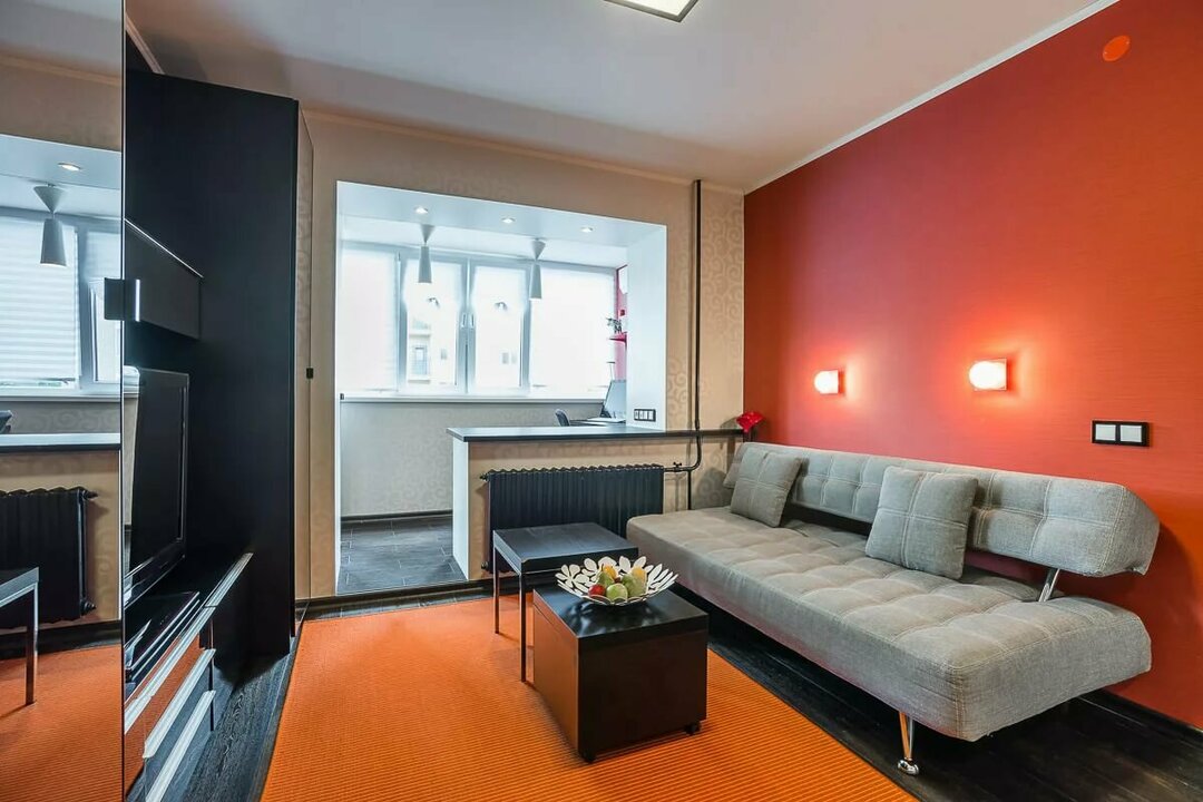 Bright accent wall in an apartment with an insulated balcony
