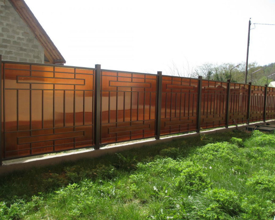 A metal fence with polycarbonate sheets