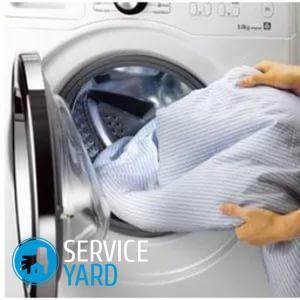 O tambor da máquina de lavar roupa bate enquanto fiação