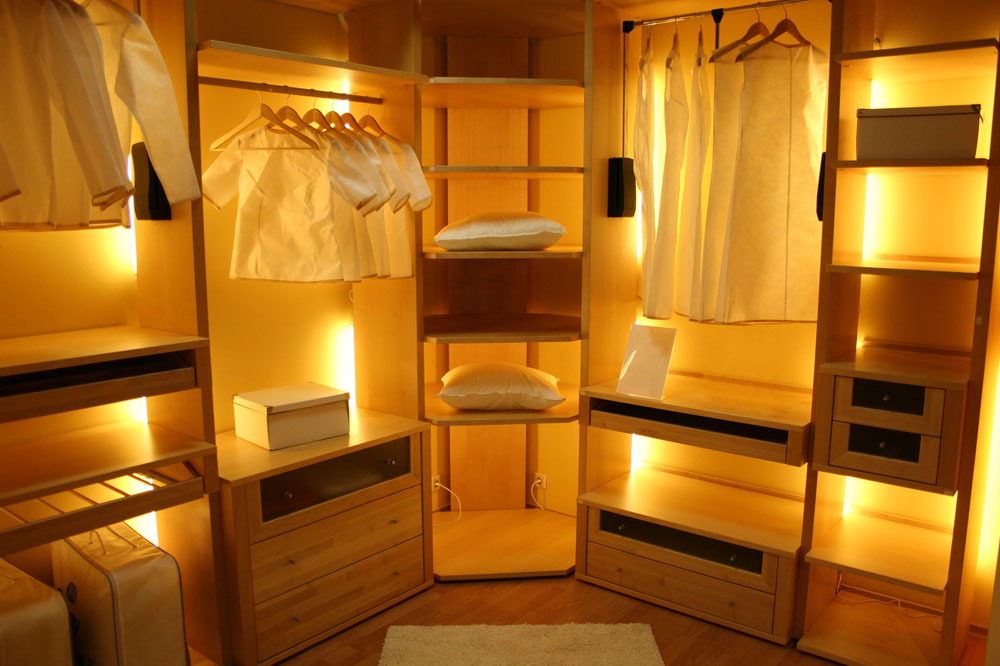 Illumination of shelves and sections in the wardrobe