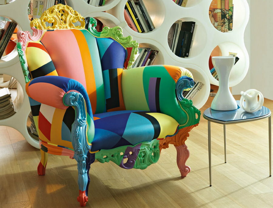 Stylish armchair with bright leatherette upholstery
