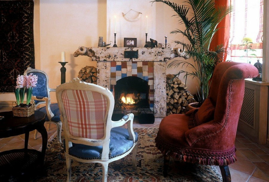 Upholstered furniture in a small room with a fireplace