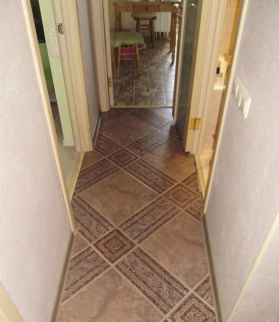 Narrow corridor with ceramic tiles
