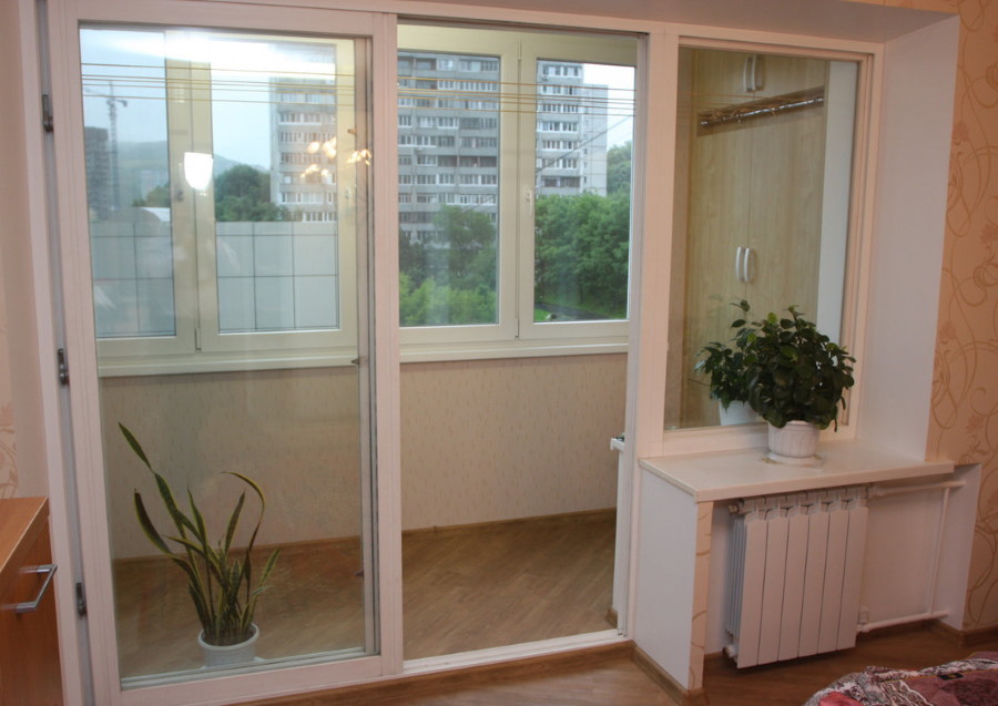 Panoramic doors on the balcony block in the apartment