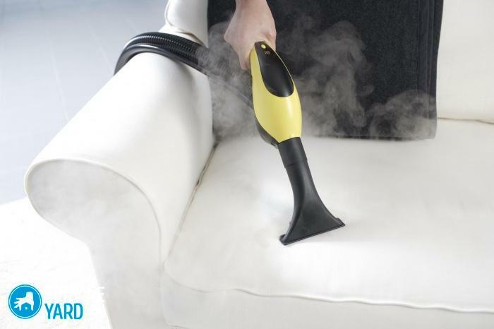 Cleaning the furniture with a steam cleaner
