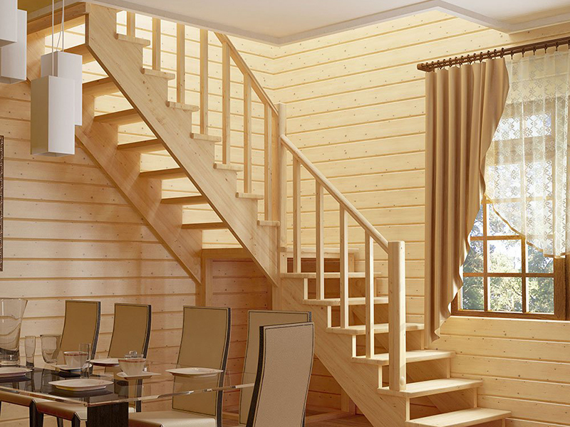 Drewniane schody na piętro z zakrętem