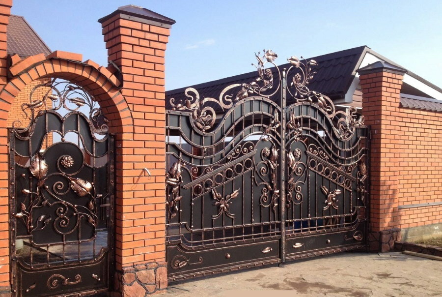 Forged gates on brick pillars