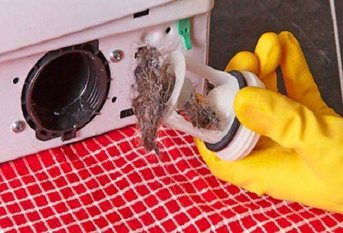 How to clean a washing machine filter at home