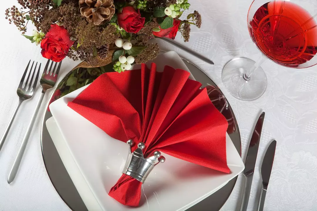 How to beautifully fold fabric napkins on a festive table: material, shape and color, folding methods