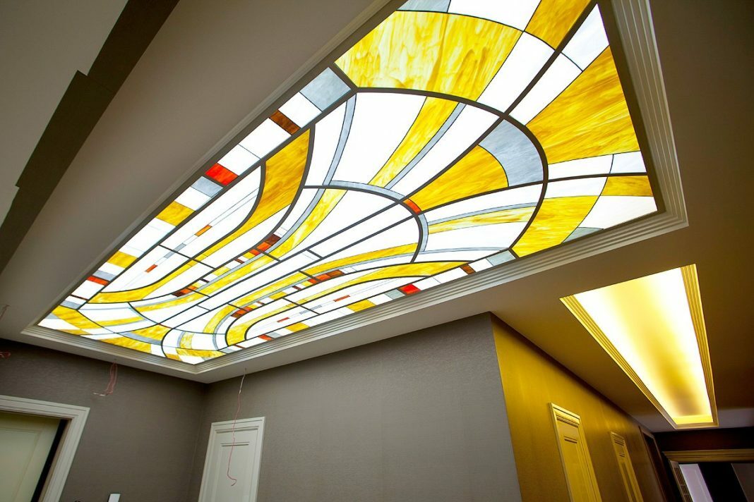 Stained-glass windows on the ceiling of the hallway in the apartment