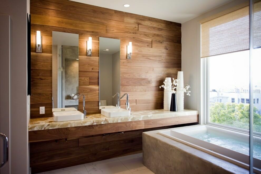 Laminate finish on the wall above the washbasin in the bathroom