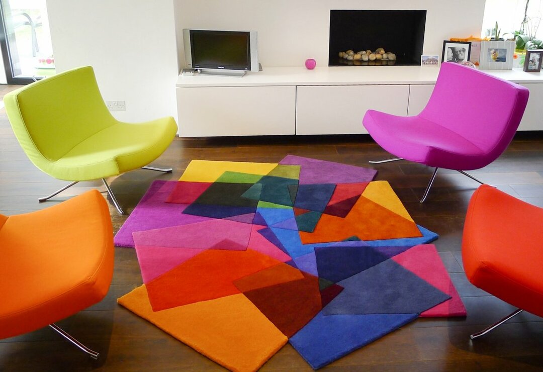 Teppich im Wohnzimmer auf dem Boden: schöne Optionen für das Interieur des Raumes, Fotobeispiele