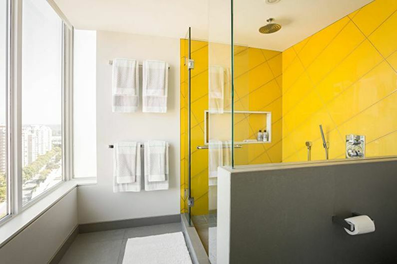 Zagospodarowanie przestrzenne łazienki w kolorze żółtym