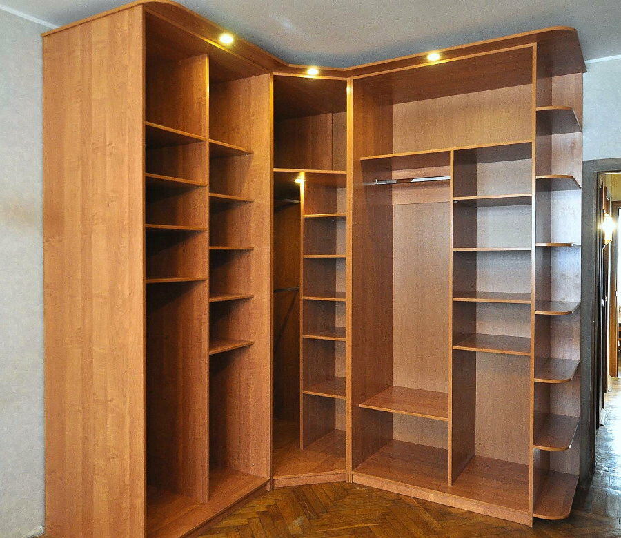 Photo of shelves inside the corner wardrobe