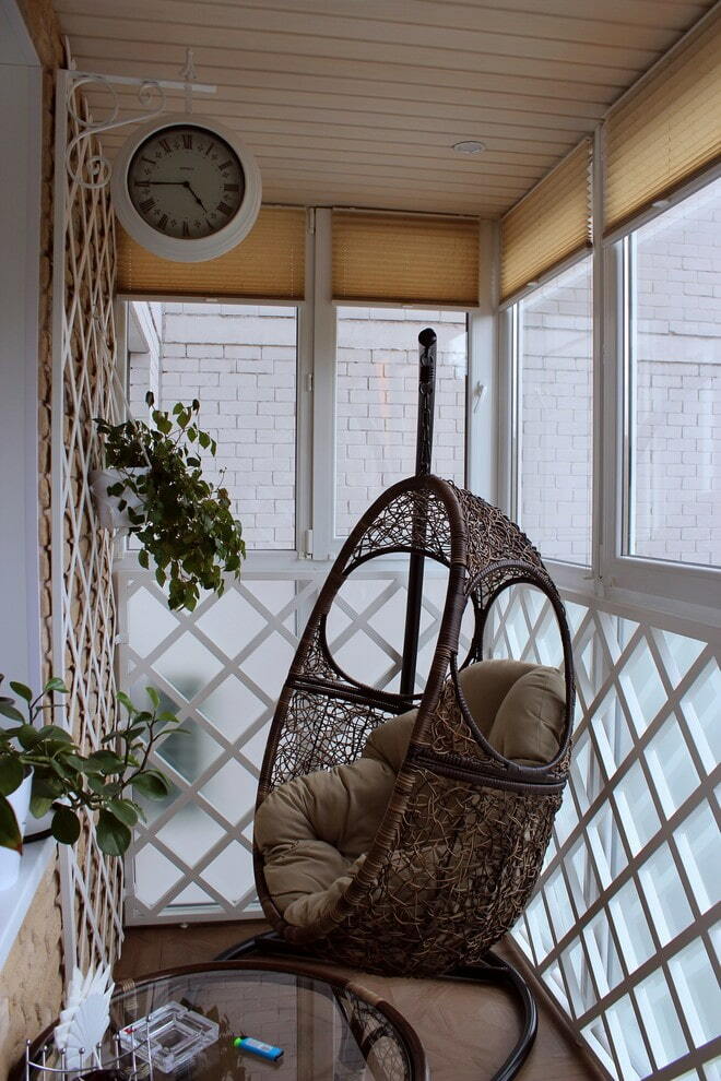 Hanging chair on the counter in the interior of the balcony