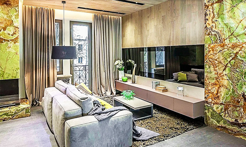 Le tende in lino tinta unita si adattano perfettamente al design futuristico del soggiorno