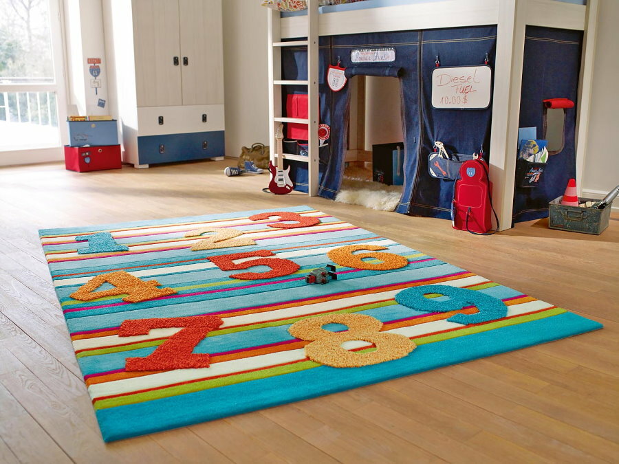 Bright woolen carpet for the nursery