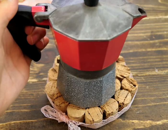 This stand is perfect for a kettle or even a frying pan. A thick layer of cork will reliably protect the countertop from the hot bottom of the dishes, and the original design will decorate your kitchen. And even if you cut the cork into 4 pieces, it will also be a reliable support for hot dishes.