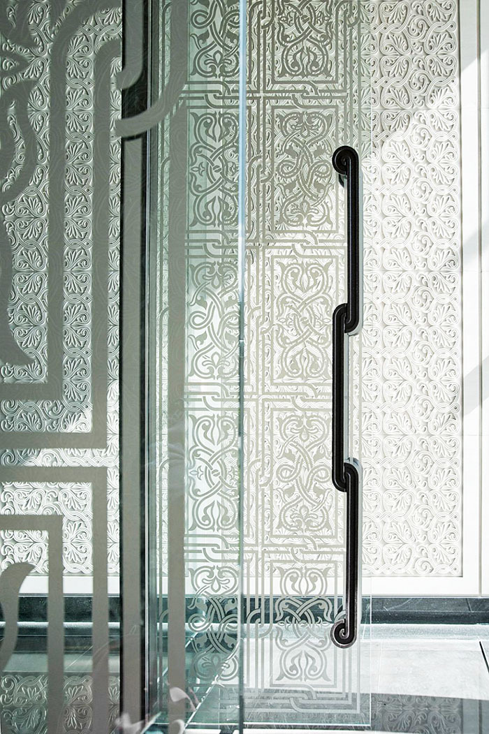 Asian-style laser engraving on glass partitions
