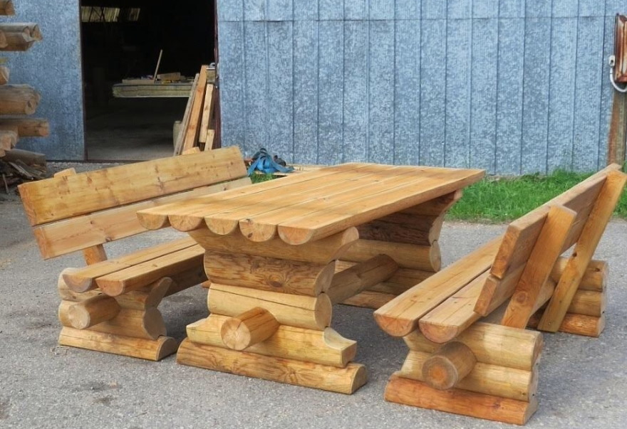 Furniture from logs for a garden gazebo