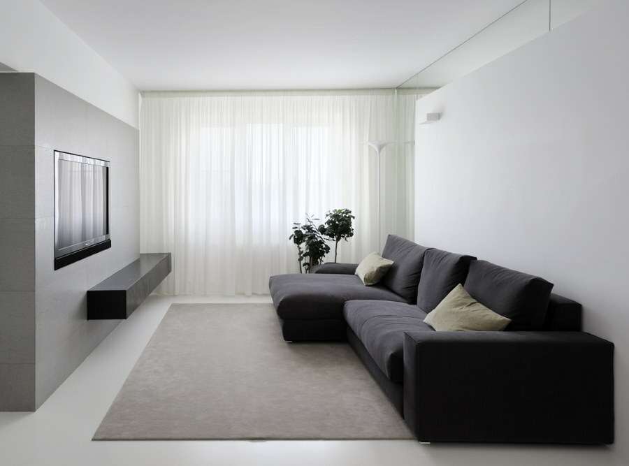 Sala de estar retangular em estilo minimalista