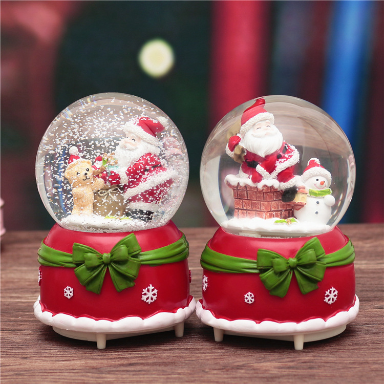 Jõulumaailma jõuluvana muusikakasti lumevibu pöörleva kristallkingiga