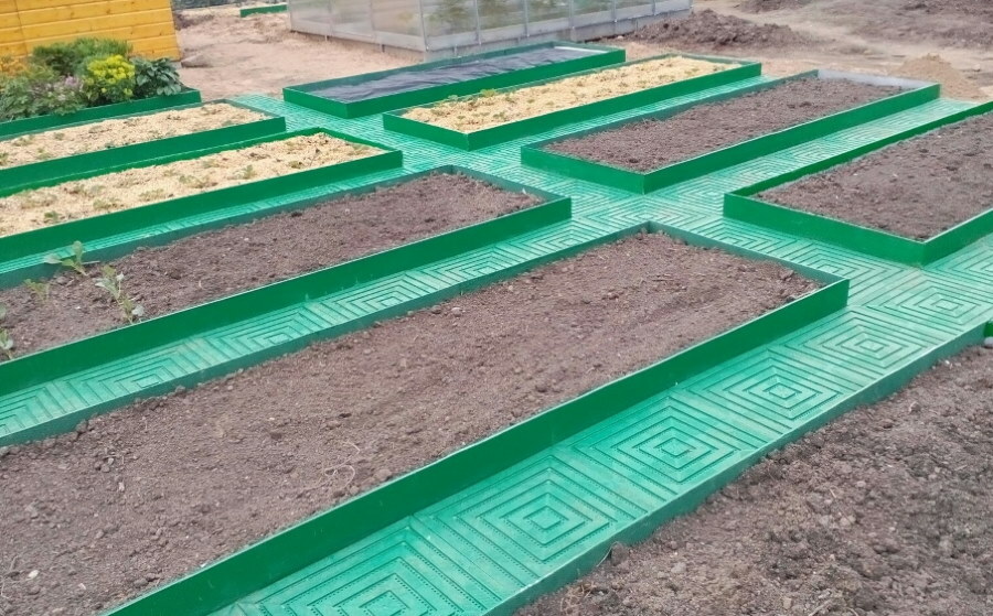 Green beds from flat slate in the country
