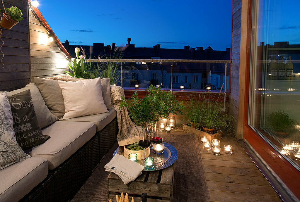A cozy place to relax on the open balcony of a private house