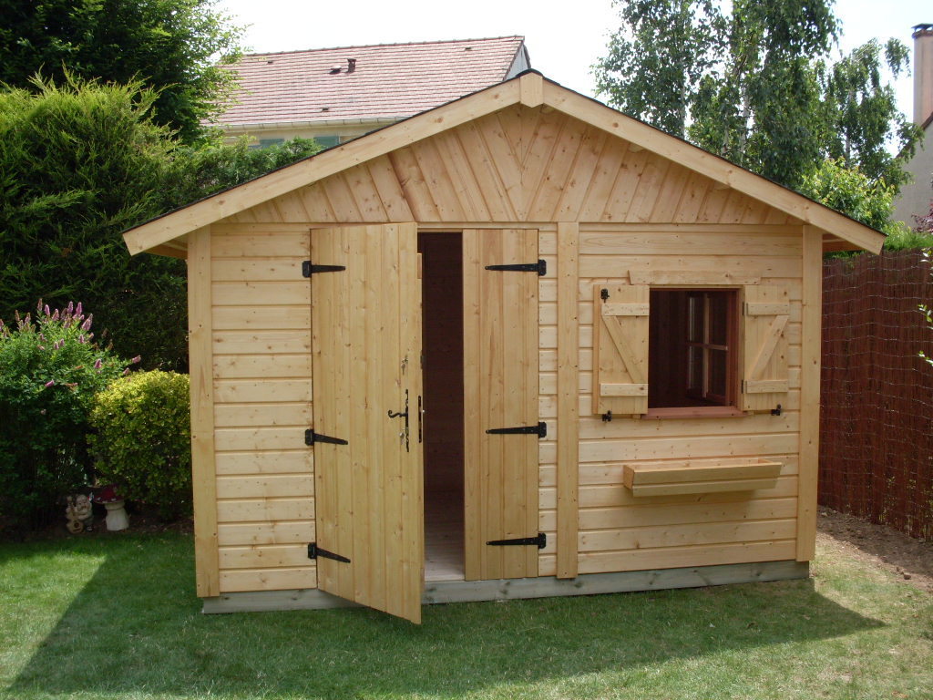 Garden shed of grooved planks