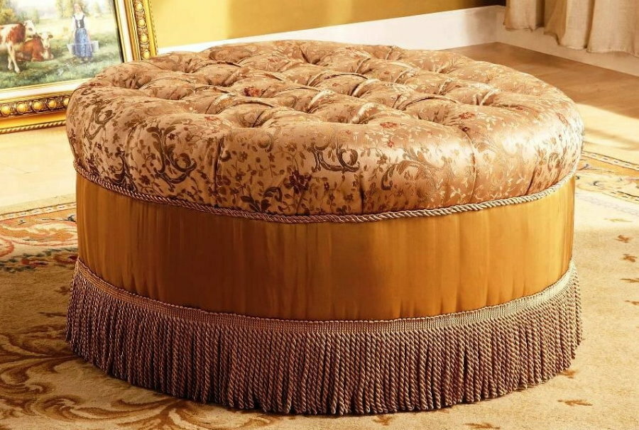 Round ottoman with fringed bottom