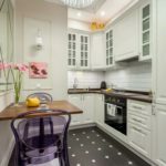 Light kitchen furniture with dark countertops