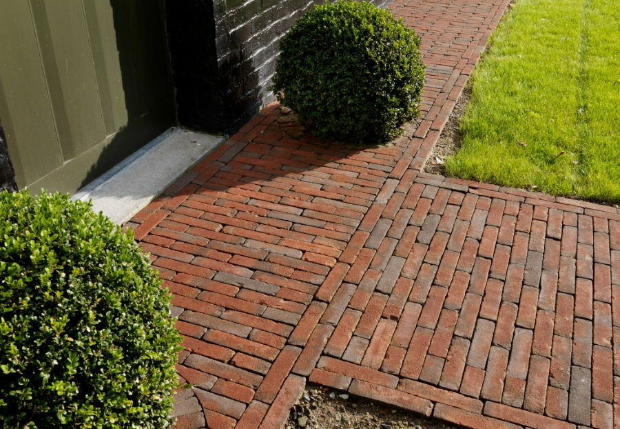 Brick path in front of the entrance to a private house