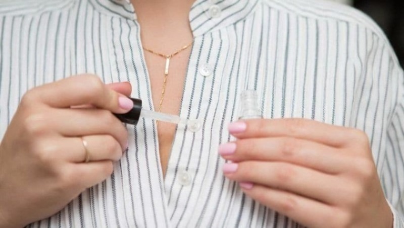How to sew on a button without a needle and thread