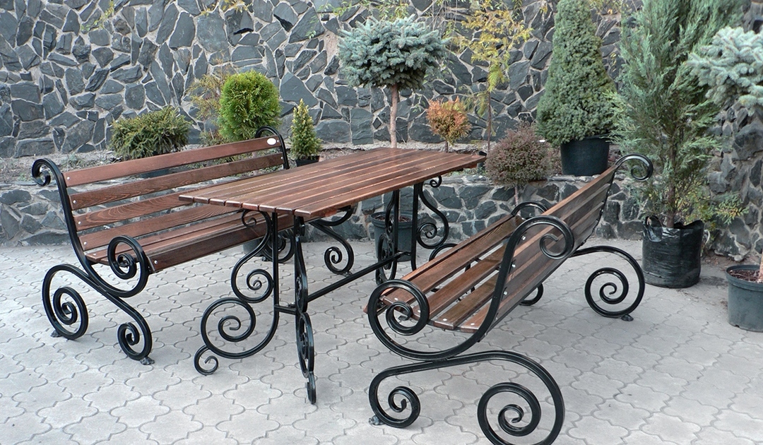 wrought iron benches and table